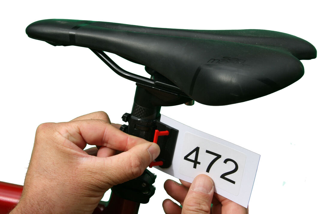 Image showing how to attach a bike numbering clip