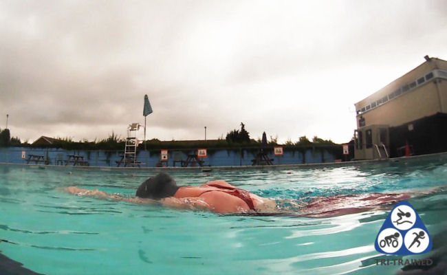 Swimmer perforing a streamline kick swim drill in Sudbury with Tri-Trained